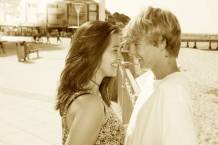 88983454-young-couple-hugging-in-the-city-beach-seaside.jpg